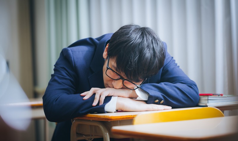 睡眠負債を抱える学生